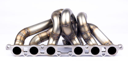 https://cdn.shopify.com/s/files/1/0006/5788/3197/products/IS200-turbo-manifold-ports.jpg?v=1677860370
